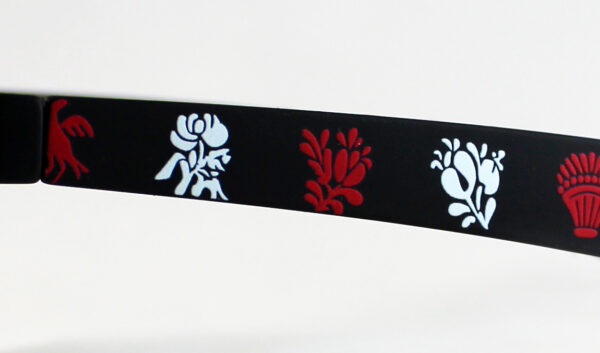 Gafa negra y dibujo en color Blanco/rojo, lente marrón o espejo rojo polarizada, o espejo azul de gran calidad, diseñada en Valencia y fabricada en Italia.