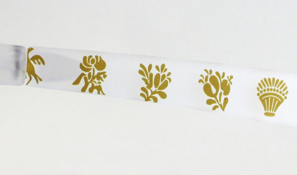 Gafa transparente mate y dibujo en color oro, lente marrón o espejo gris polarizada de gran calidad, diseñada en Valencia y fabricada en Italia.